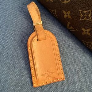 Authentic Louis Vuitton luggage tag